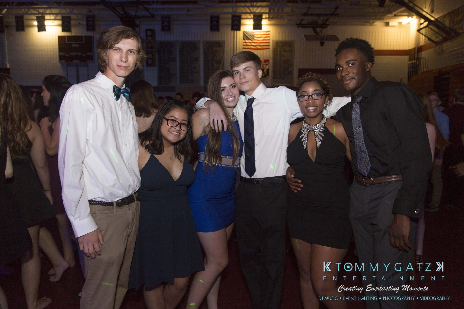 Broadneck-HC-FINAL-2017-BLOG-LoRes-WM-68 - TOMMY GATZ ENTERTAINMENT A group of six people dressed in formal attire pose together at an indoor event.