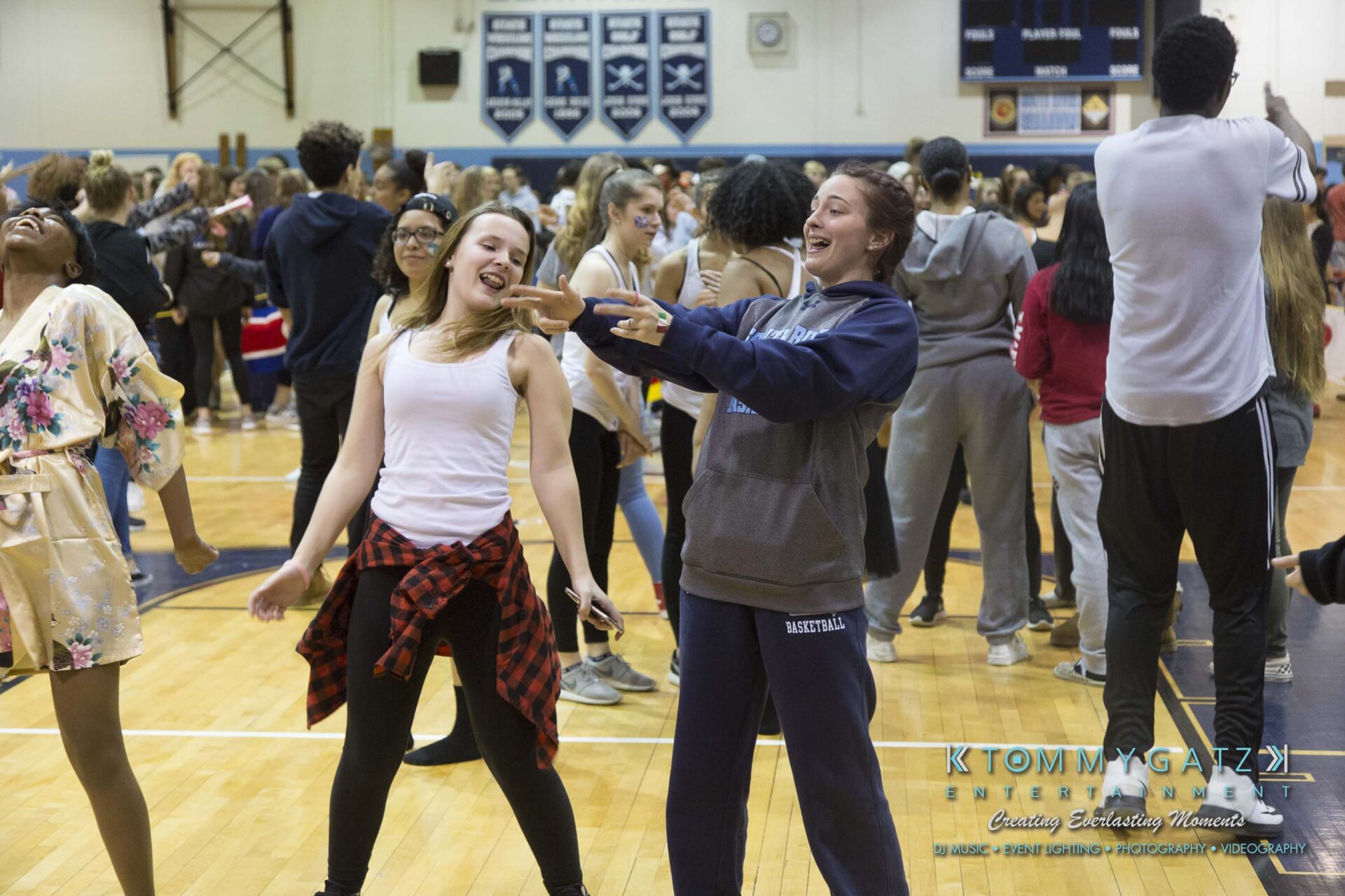 SR-Cultural-Day-2018-Low-Res-WM-50 - TOMMY GATZ ENTERTAINMENT A group of people dancing and having fun in a gymnasium.