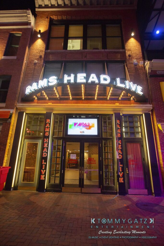 LWYD-Comedy-Tour-Baltimore-060118-FINALS-Low-Res-Watermark-267 - TOMMY GATZ ENTERTAINMENT Entrance to Rams Head Live, a music venue with illuminated signage and a brick facade, photographed at night.