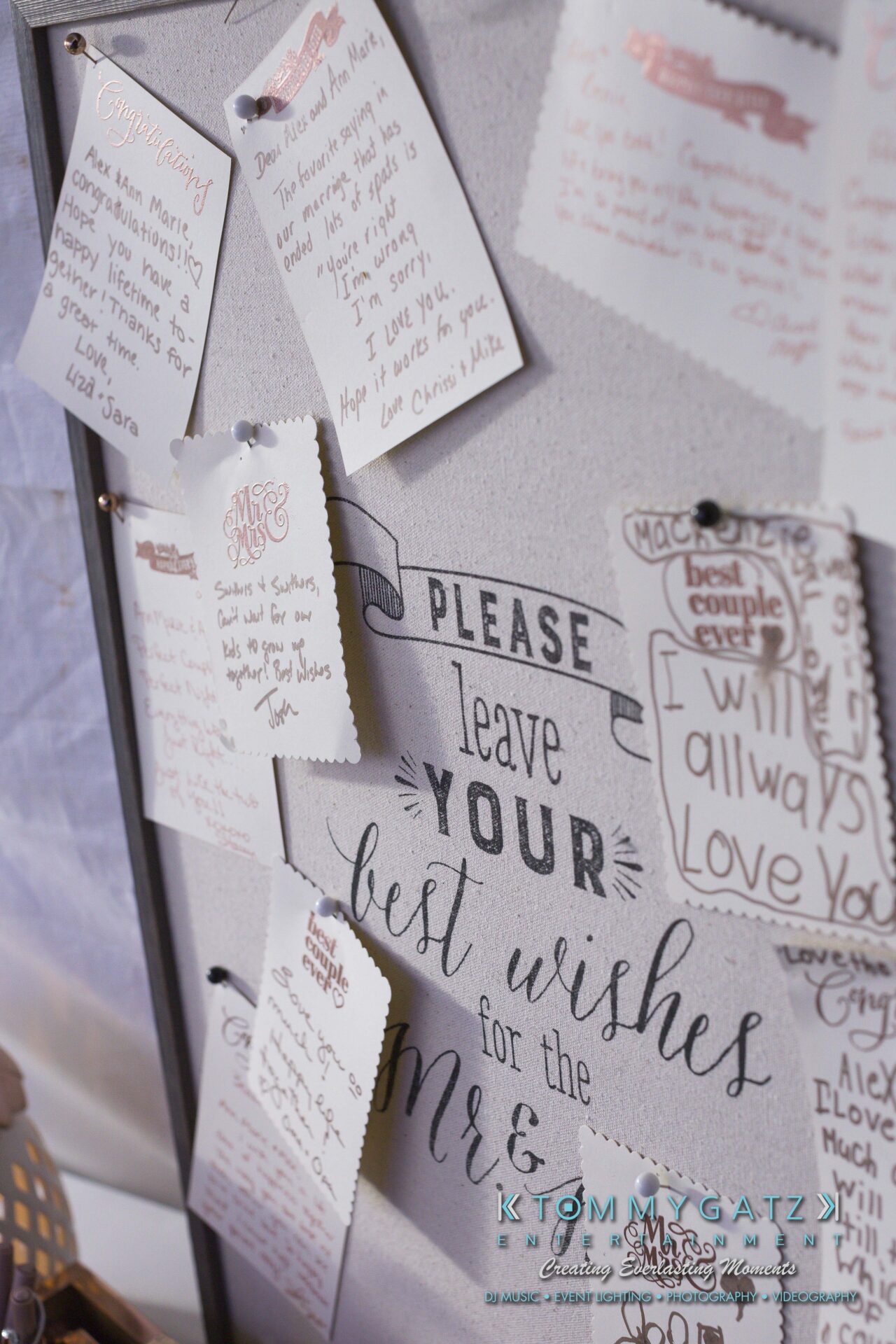 Ann-Marie-Alex-92317-RECEPTION-Low-Res-WM-53 - TOMMY GATZ ENTERTAINMENT A board displays various handwritten notes and well-wishes for the couple, with a sign reading "Please leave your best wishes for the Mr. & Mrs.