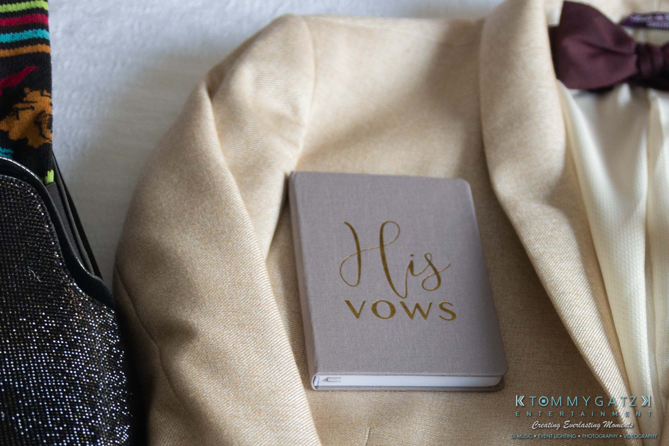 Harris-Wedding-HIGHLIGHTS-090119-37 - TOMMY GATZ ENTERTAINMENT A beige suit jacket with a "His Vows" notebook pocketed inside.