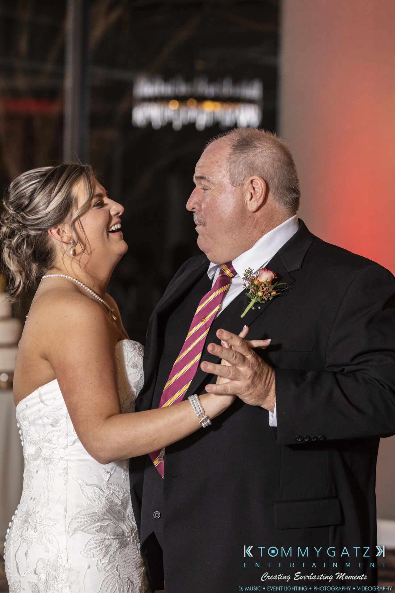 Lisa-Robert-092218-BLOG-selections-WM-91 - TOMMY GATZ ENTERTAINMENT A bride in a white dress dances with an older man in a suit and striped tie at an indoor event.