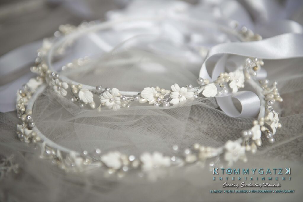 Delicate floral headbands with ribbons and small pearl accents on sheer fabric, with a logo in the corner.